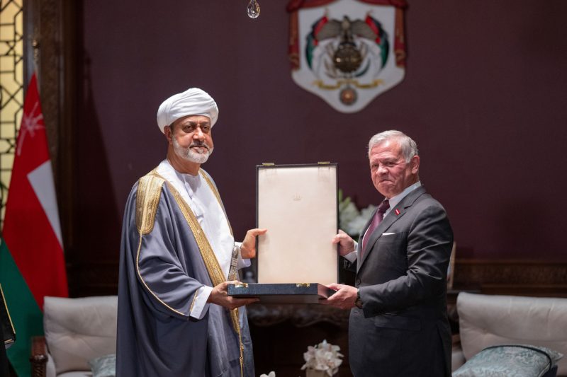 His Majesty and King Jordan exchange decorations