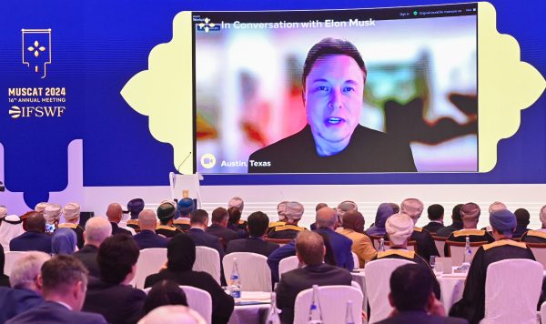 Eion Musk speaks at the Forum via video link 