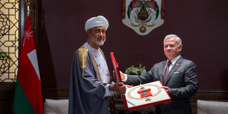 His Majesty and King Jordan exchange decorations